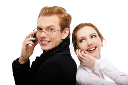 Red-haired couple with cellphones
