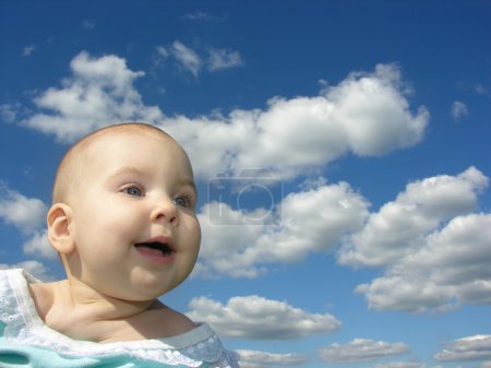 Happy Baby Under Clouds