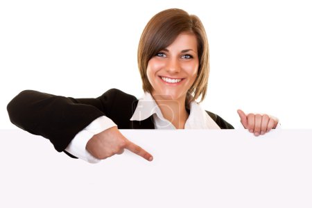 Business woman holding big blank paper