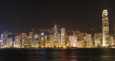 Hong Kong cityscape at night. No brand names or copyright objects.