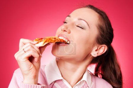 Pretty woman love eating pizza