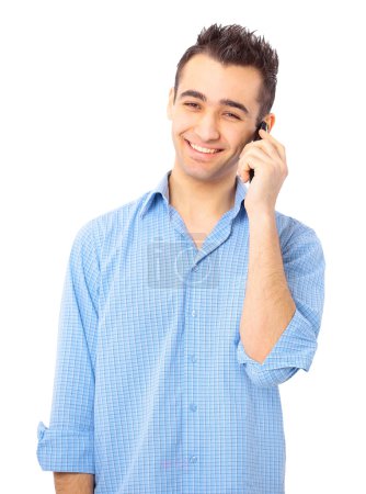 Young casual man talking on the phone isolated on white background