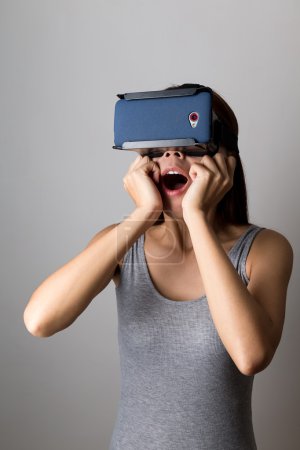 Woman using the virtual reality equipment