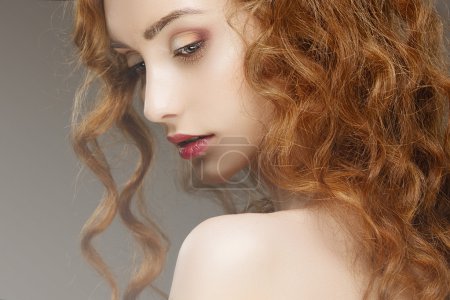 girl  with red curly hair