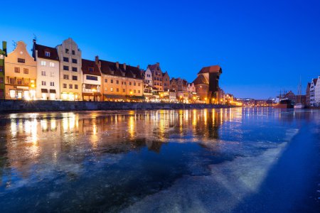Old town of Gdansk at frozen Motlawa river