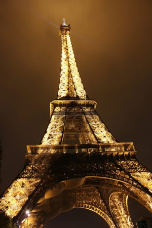 Illuminated Eiffel tower at night