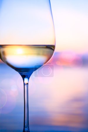 Art white wine on the summer sea background