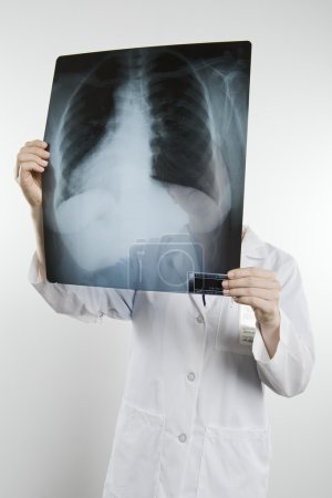 Doctor With Xray Covering Face