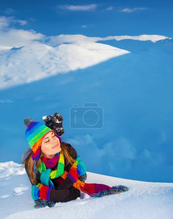 Woman in snowy mountains