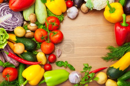 Fresh Organic Vegetables on wooden Table - Round