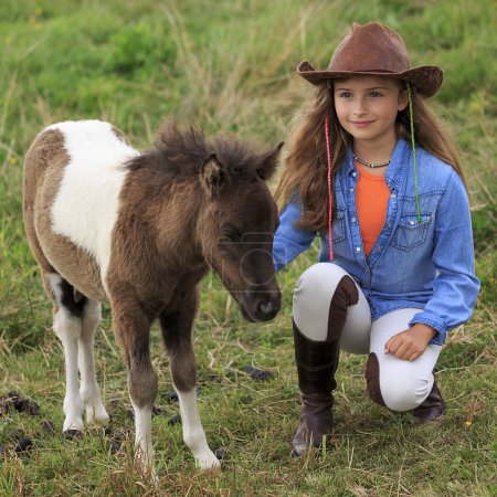 Ranch - Lovely girl with pony on the ranch