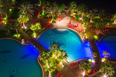 Tropical pool area at night