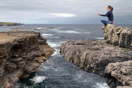 Meditation on the edge of a cliff