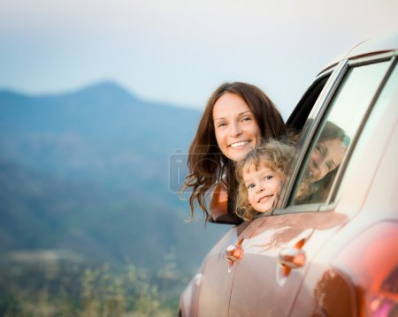 Happy family travel in car