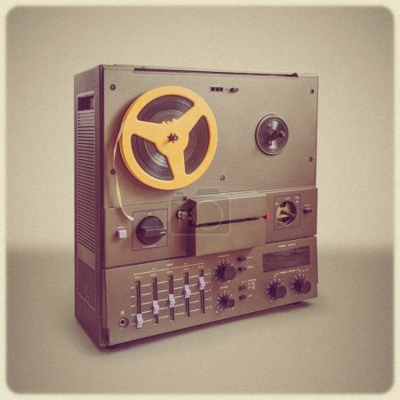 Soviet Retro audio tape recorder on vintage background and stylized instagram