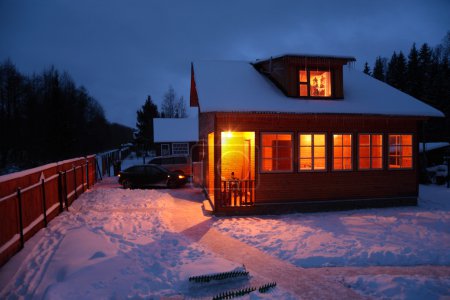 Country house in winter evening