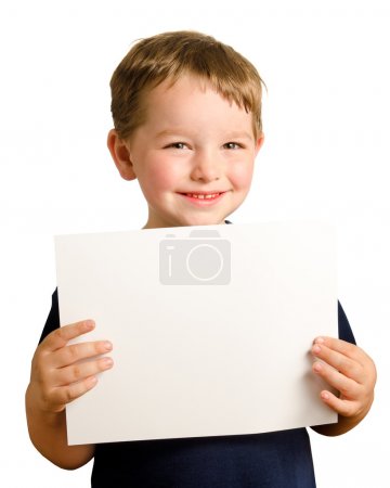 Cute young happy preschooler boy holding up blank sign with room for copy isolated on white
