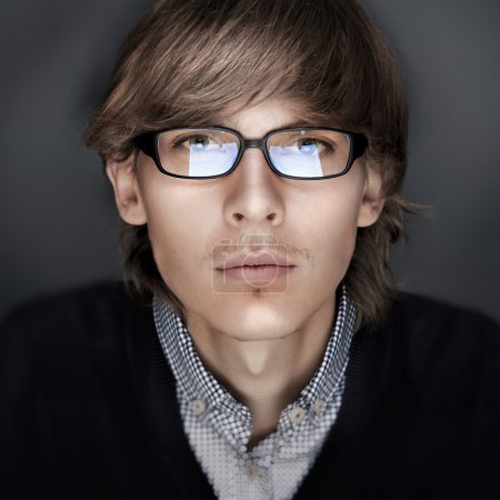 Portrait of young esquire man with smart and wise look. Looking