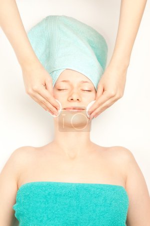 Young woman at spa procedures