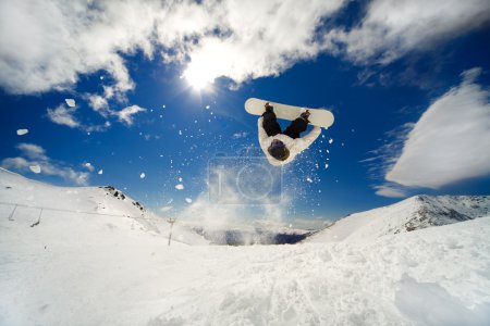 Snowboarder backflip