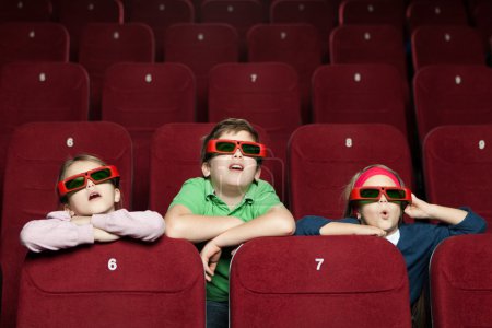 Surprised children at the cinema