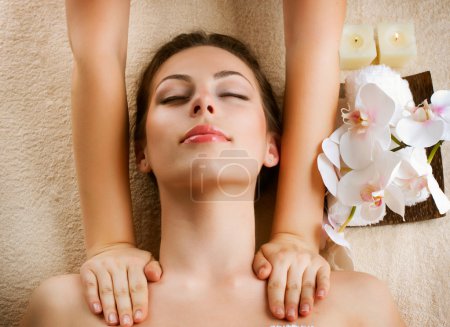 Spa Massage. Beauty Woman Getting Massage
