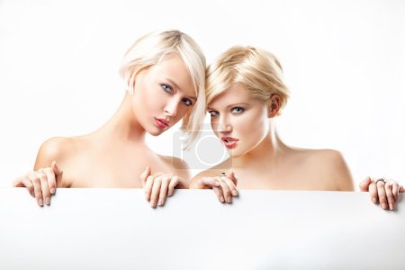 Young girls on the white background