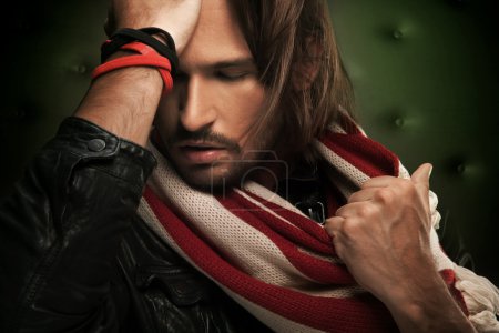 Handsome man wearing scarf