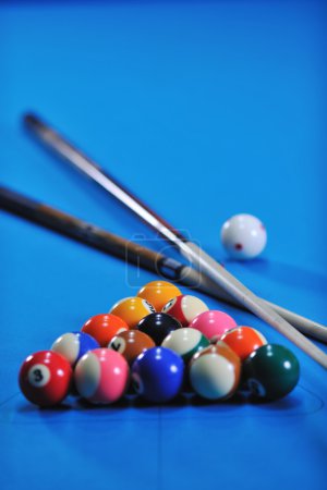 Young man play pro billiard game
