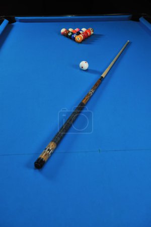 Young man play pro billiard game