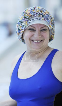 Senior woman at swimming pool