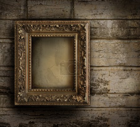 Old frame against a peeling painted wall