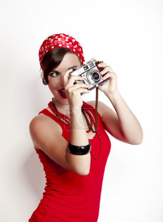 Pin-up girl with a camera