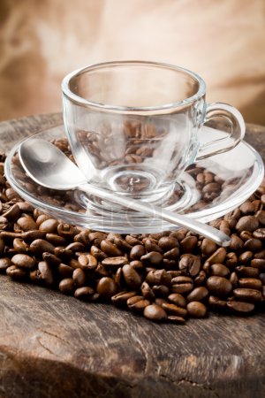 Empty Glass Cup on Coffee Beans