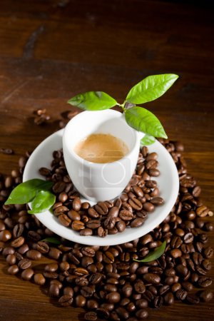 Espresso with green leaves