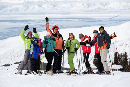 Group of friends, enjoying at mountain ski resort