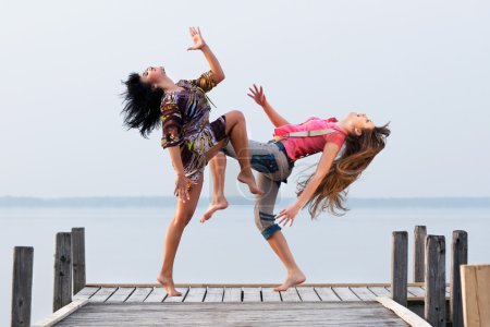 Two girl are dancing