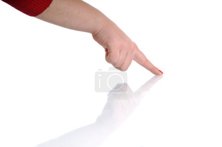 Woman hand holding glossy reflective surface