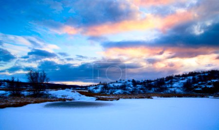 Winter north lake and sunset