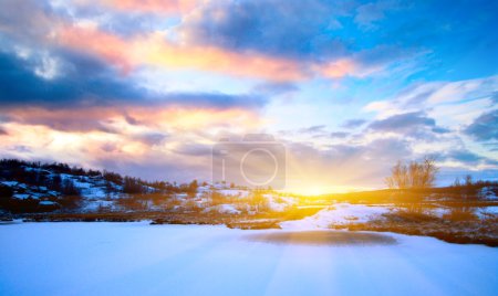 Winter north lake and sunset