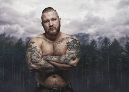 Shirtless male over wild nature
