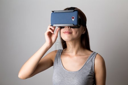 Woman using the virtual reality equipment