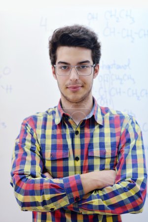 Teenage boy  on chemistry classes