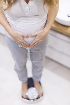 Pregnant woman controls her weight