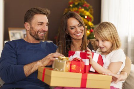 Happy family with christmas gifts