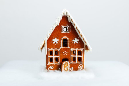The hand-made eatable gingerbread house and snow decoration