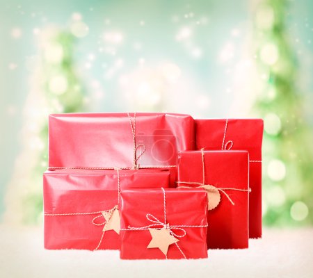 Gift boxes on christmas trees background