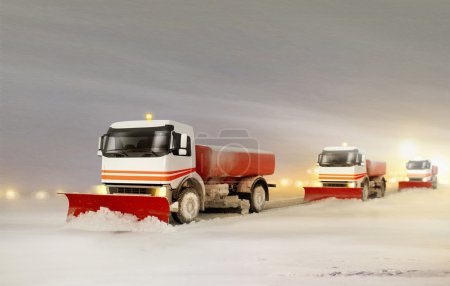 Snowplow Trucks Removing the Snow