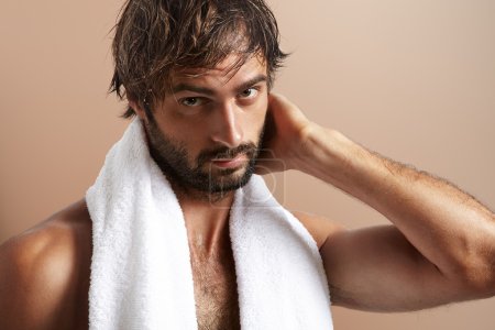 Handsome man with towel