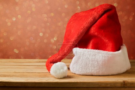 Santa hat on wooden table